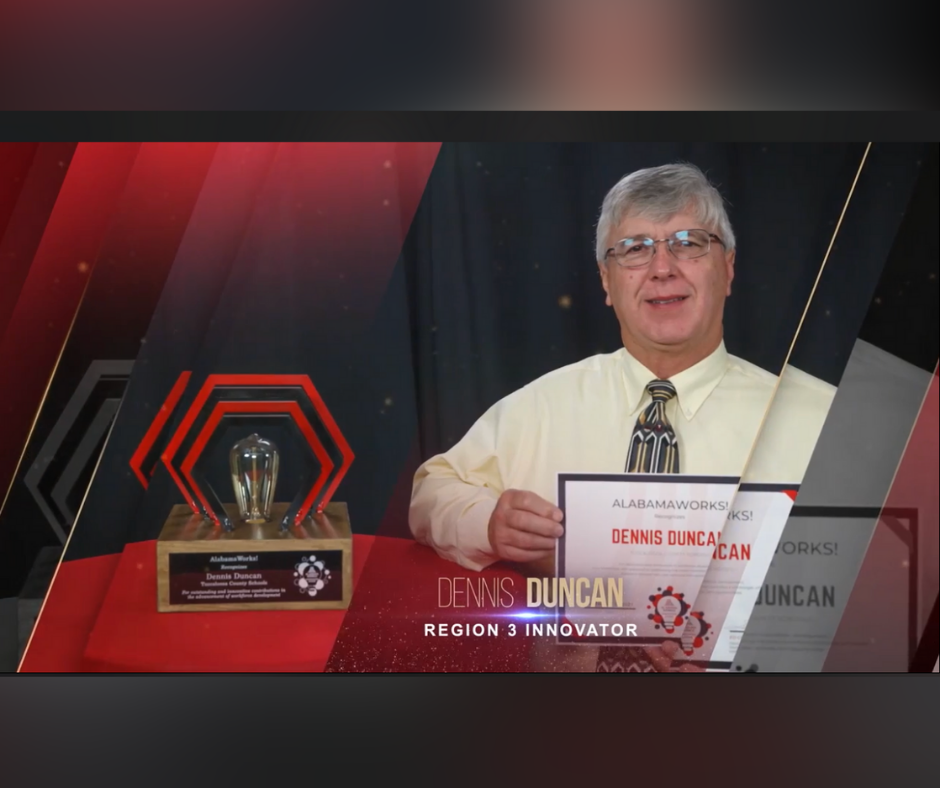 Mr. Dennis Duncan with award. Mr. Dennis Duncan with award.